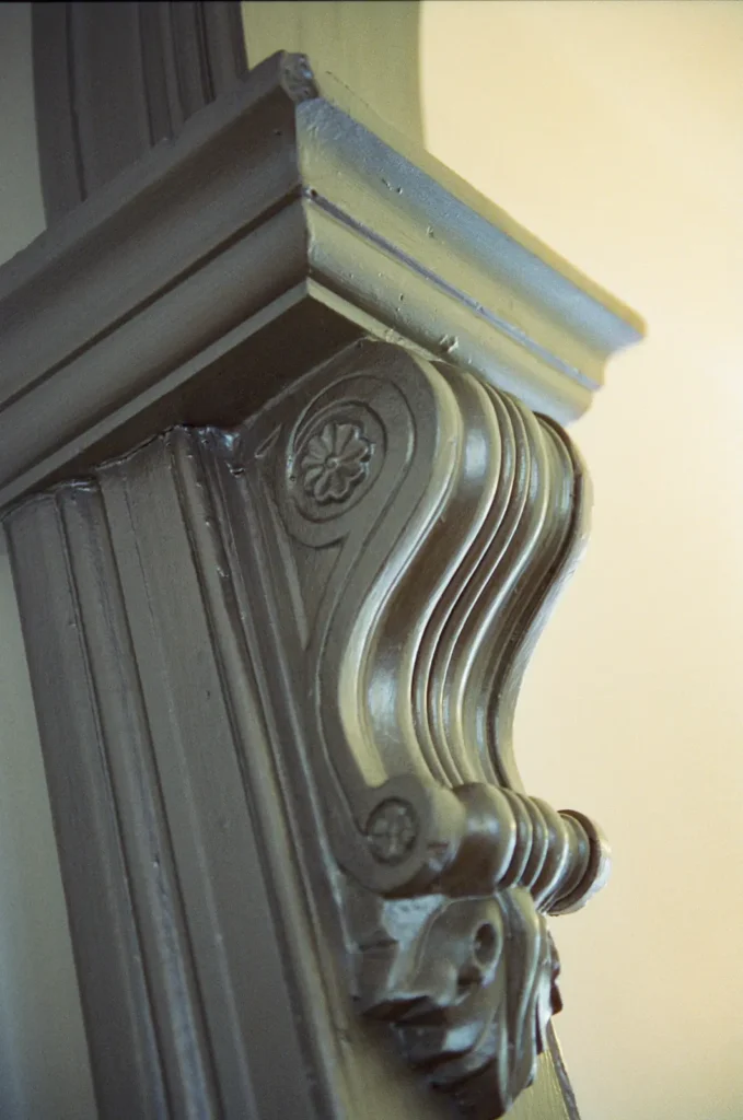 A carved timber corbel, close