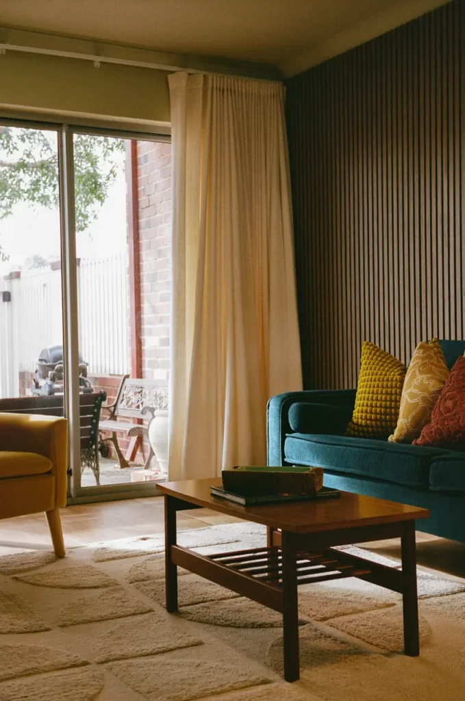 The lounge at The Tonic with curtains drawn back to the courtyard